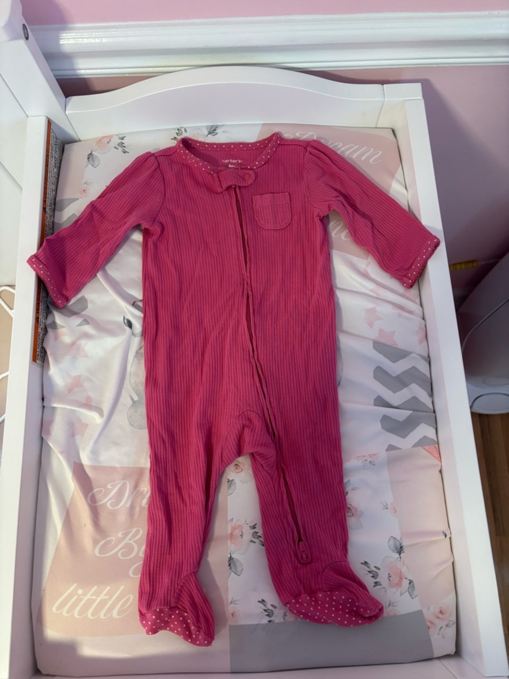 Carter's Pink Baby Onsie with hearts on foot